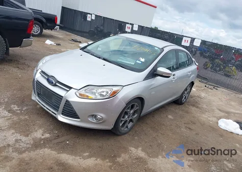 2014 Ford Focus Se z USA, uszkodzony, nr VIN 1FADP3F21EL320009